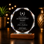 Personalized crystal award trophy with laser engraving, multi-faceted crystal design, and elegant wooden base for corporate recognition and employee awards.