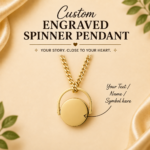 Custom engraved spinner pendant necklace in gold tone with rotating circular centre for personalized name, text, or symbol