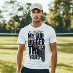 My Gun Is Much Bigger Than Yours Unisex T-Shirt worn by a model, showcasing the bold graphic design in a premium lifestyle setting.