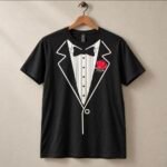 Black tuxedo graphic t-shirt featuring white formal tuxedo design with red rose boutonniere
