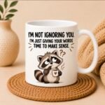 Sarcastic everyday life mugs featuring funny raccoon, grumpy cat and owl designs on white ceramic mugs.