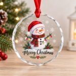 Christmas crystal glass ornament featuring a cheerful snowman with Merry Christmas design